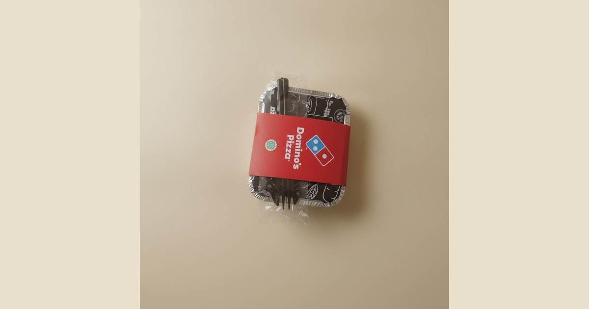 Takeout food packaging on a light colored surface.